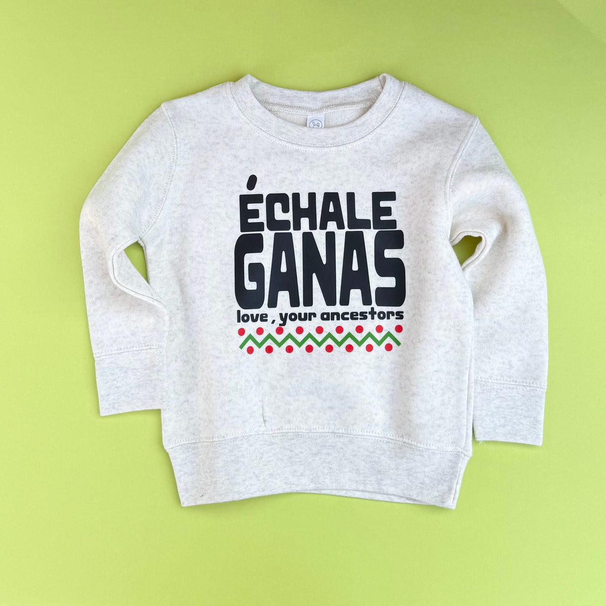 Light-colored kids sweatshirt with Échale Ganas and love, your ancestors graphic